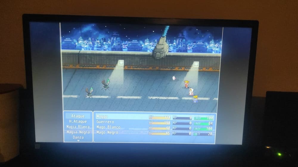 A photo of a computer playing Final Fantasy Story Keepers during a battle againts enemies.