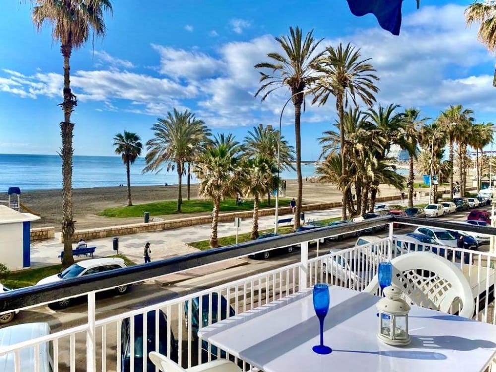 View of the Malagueta beach with  the Mediterranean Sea in the background.