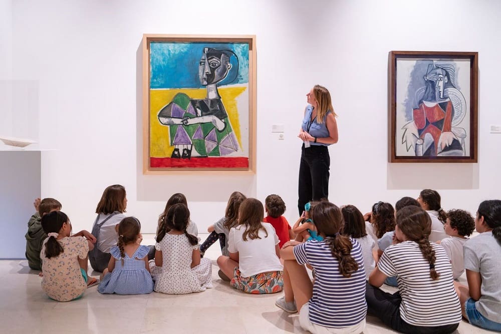 Some children enjoying an educational program at Picasso Museum.